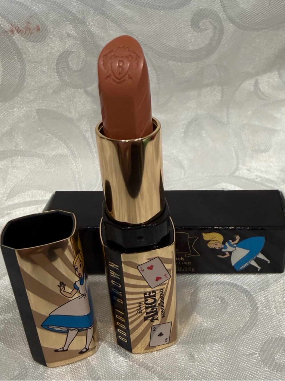 Bobbi Brown Lipstick Peach Paradoxical. Alice in Wonderland design. New
